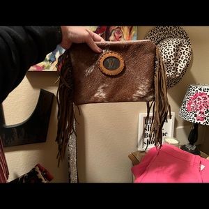 Cowhide Louis Vuitton clutch wristlet